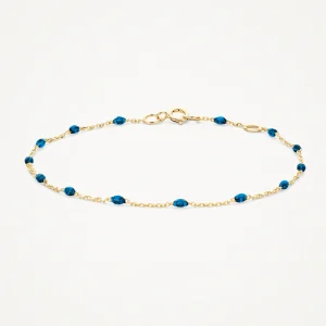 Bracelet avec pierres en résine bleue éclatant ⌀ 0,7 mm en or jaune